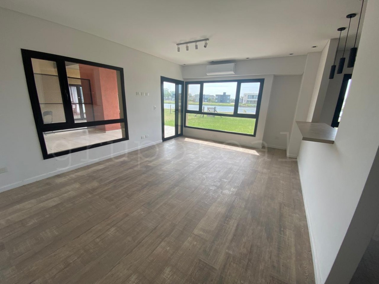 LOS TALAS - Departamento 2 ambientes con gran parque privado a la laguna