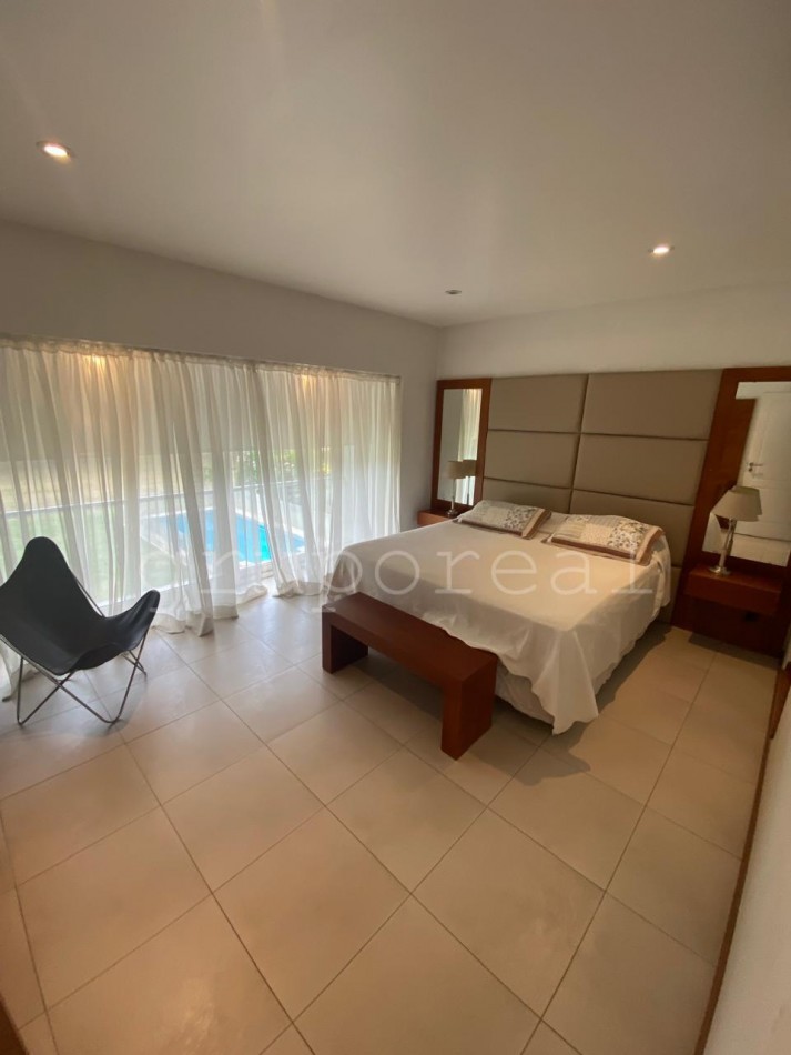 EL OMBU - Casa estilo moderno sobre lote al golf